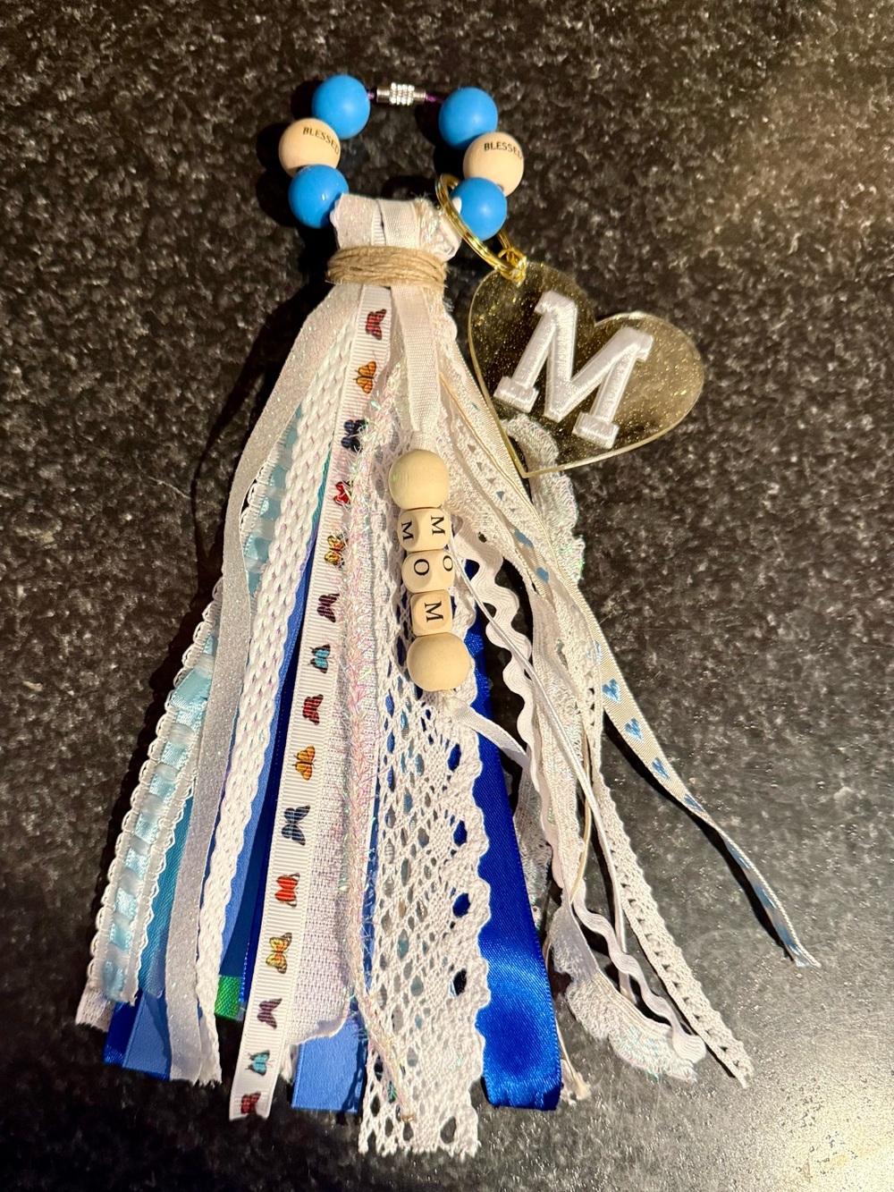 Blue and White Ribbon Tassel Keychain with 'M' Heart Charm